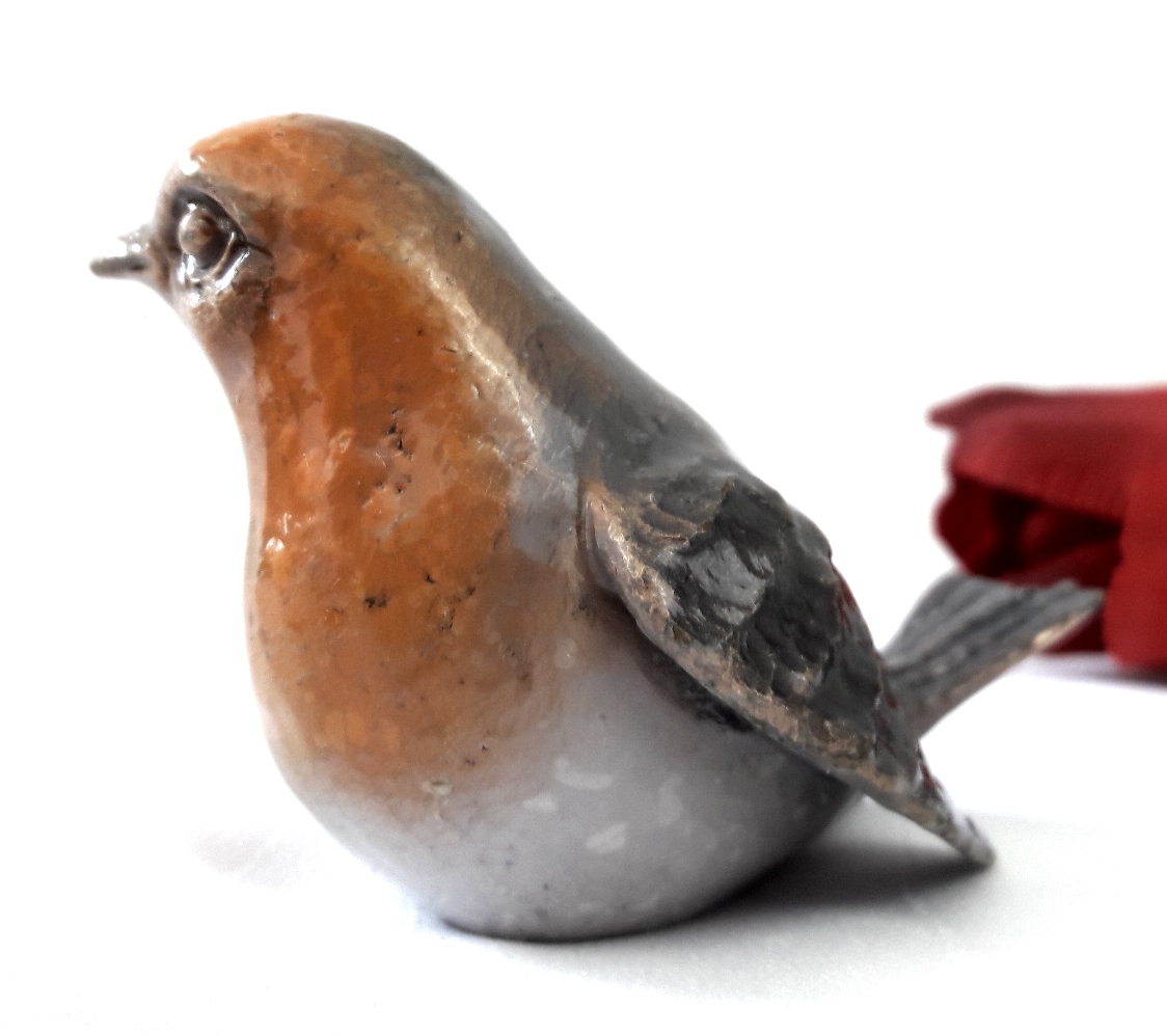 Grabgestaltung,Bronzeschmuck, Vogel