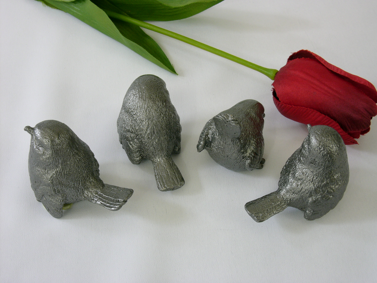 Sperlingsgruppe Bronze silberfarben